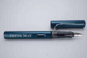 Fountain pen engraving in traditional serif typeface